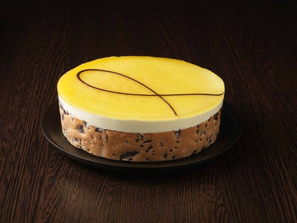 Comment préparer un gâteau de semoule au lait et raisins secs parfumés au rhum ?